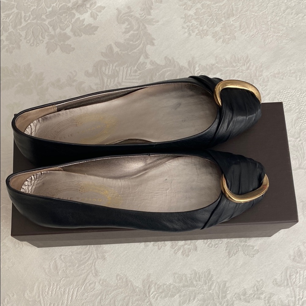 Elie Tahari Black and Gold Flats with Sleek Design